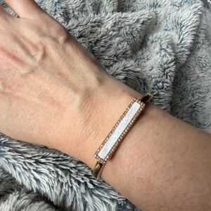 Elegant Gold and White Bracelet